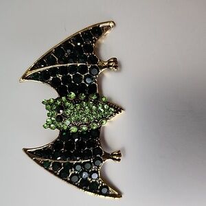 Rare Bat Brooch Covered In Simulated Emeralds And an Antique Finish BRO